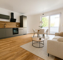 NEUBAU-ERSTBEZUG: 2-Zimmerwohnung mit Balkon, hochwertiger Einbauküche und Tiefgaragen-Stellplatz - Frankfurt am Main Sindlingen