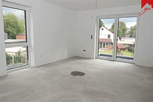 Wohn- und Essbereich - Neubau! Obergeschosswohnung mit ansprechendem Balkon in schöner Lage von Schortens!