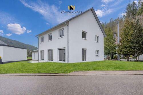 Bild 1 - Neubau-Erstbezug: Hochwertiges Familienhaus mit 168 m², Terrasse und Doppelgarage