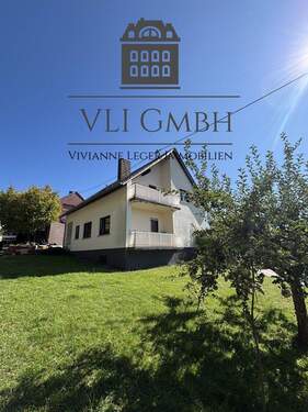 Bild 1 - Freistehendes Einfamilienhaus mit gr. Garage & schönem Grundstück in Mandelbachtal-Heckendalheim
