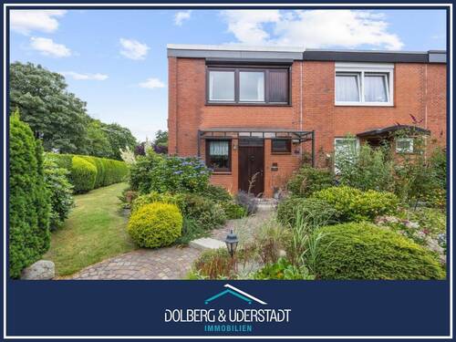 Titelbild - Attraktive Lage: Reihenendhaus mit großem Wintergarten sowie Vollkeller und Garage