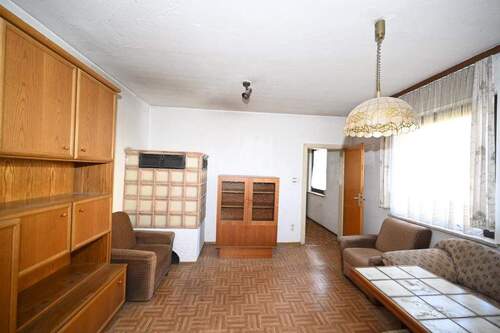 Wohnzimmer mit Kachelofen - 