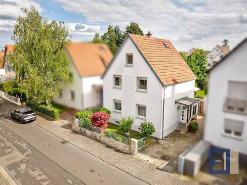 Vorderansicht - 6 Zimmer Einfamilienhaus zum Kaufen in Rüsselsheim