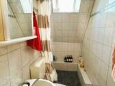 Badezimmer im Dachgeschoss - 