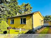 Hausansicht Garage Straße - 4 Zimmer Einfamilienhaus zum Kaufen in Oranienburg / Lehnitz