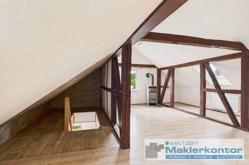 Dachgeschoss/Wohnbereich mit Kamin - 