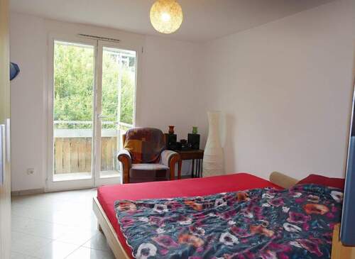 Schlafzimmer mit Balkonzugang - 