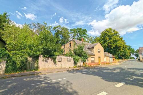 Straßenansicht links - 1 Zimmer Einfamilienhaus zum Kaufen in Wanzleben-Börde