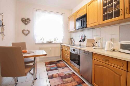 Küche mit Einbauküche 1.OG - Etagenwohnung mit 65,70 m&sup2; in Rheinsberg zum Kaufen