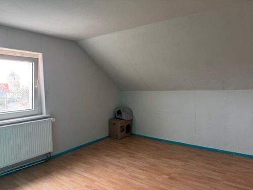 Zimmer im Dachgeschoss - 