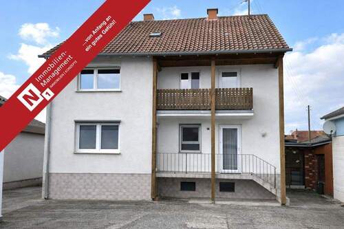 Titelbild - Freie Bahn für Ihre Ideen: Mehrfamilienhaus mit Potenzial auf knapp 1.000 m² Grundstück