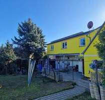 Familientraum mit Entwicklungspotenzial - DHH mit Garage & grünem Garten - Wermsdorf