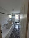 Badezimmer mit Wanne - 