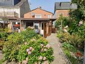 Blick aus dem Garten zum Haus - Charmantes kleines Haus in Barmstedts Innenstadt