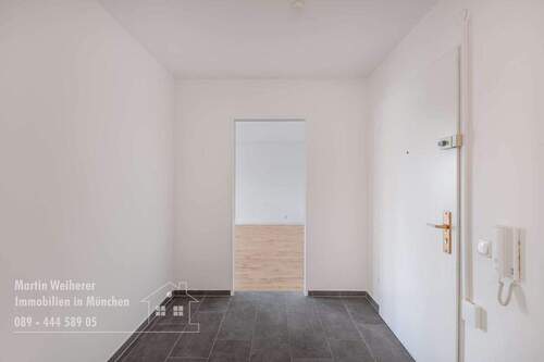 Diele Blick zum Wohnraum - Etagenwohnung mit 91,00 m&sup2; in Unterhaching zum Kaufen