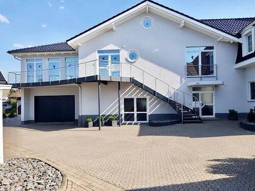 Anbau mit Doppelgarage - Einfamilienhaus mit 560,00 m² in Hille zum Kaufen