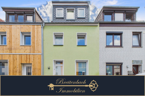 Breitenbach Immobilien - Bremen - Woltmershausen . Modernes Wohnen auf drei Ebenen - Reihenmittelhaus mit schönem Garten