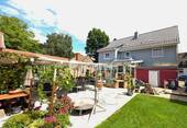 Außenansicht - Wohnen mit Stil: EFH inklusive beheiztem Wintergarten und viel Komfort