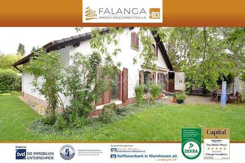 Titel Hausansicht Gartenseite - FALANGA IMMOBILIEN - Charmantes Einfamilienhaus mit herrlichem Sonnengarten im idyllischen Grünstadt!
