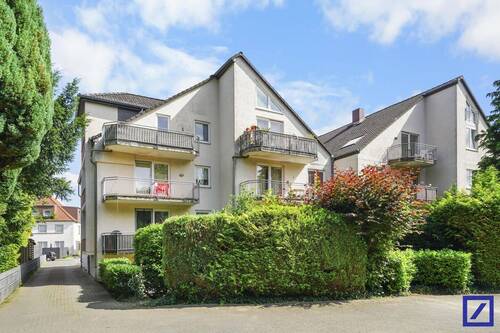Außenansicht hinten - Ruhiges Wohnen mit Terrasse - 2-Zimmer-Wohnung mit Stellplatz