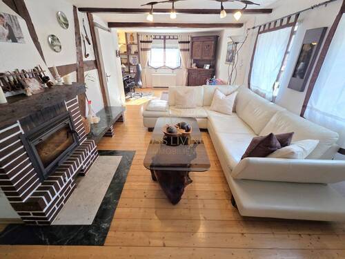 Wohnzimmer EG - 5 Zimmer Einfamilienhaus zum Kaufen in Wöllstadt