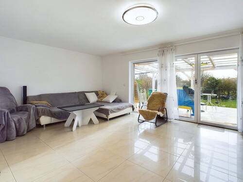 Wohnzimmer - Einfamilienhaus mit 150,00 m² in Nienhagen zum Kaufen