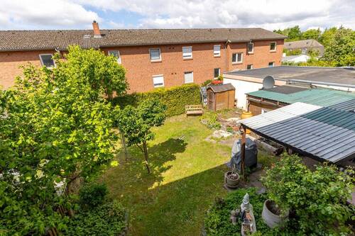 Außenansicht - Zentral gelegene 4-Zimmer-Wohnung mit Gartenanteil und Stellplätzen in Lüneburg