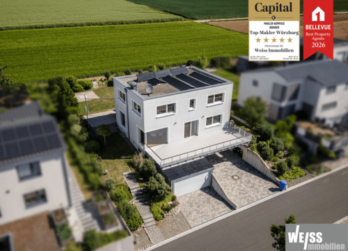 Titelbild - Einzigartige Gelegenheit! Einfamilienhaus-Highlight in Best-Lage von Estenfeld