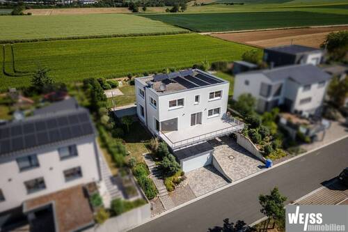1 - WeissImmo-Estenfeld-280526-001 - 6 Zimmer Einfamilienhaus zum Kaufen in Estenfeld