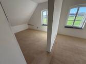 Zimmer im Dachgeschoss - 