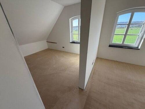 Zimmer im Dachgeschoss - 