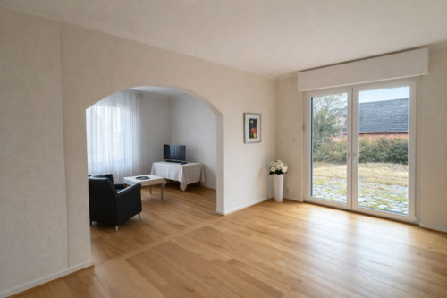 Wohnbereich mit Zugang zum Garten - 