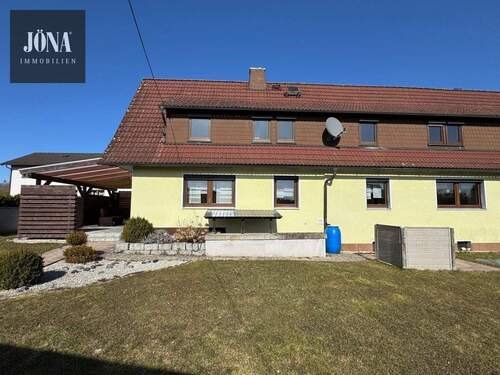 Bild 1 - Charmant sanierte Wohnimmobilie mit großem Garten und Doppelgarage in einem angenehm ruhigen Umfeld