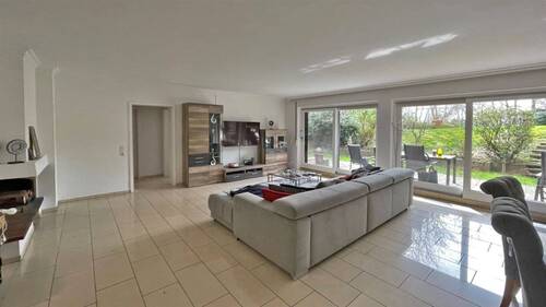 Wohnen - Immobilien-Richter: Elegante 3-Zimmer-Wohnung mit Traumgarten in Toplage von Düsseldorf-Ludenberg