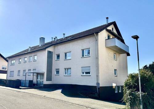 Außenansicht - Attraktive 3-Zimmer DG-Wohnung mit Balkon - gepflegt, vermietet & perspektivisch freiwerdend