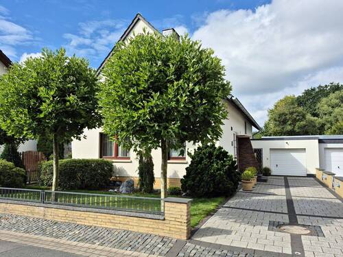 Bild 2 - 7 Zimmer Mehrfamilienhaus, Wohnhaus zum Kaufen in Porta Westfalica