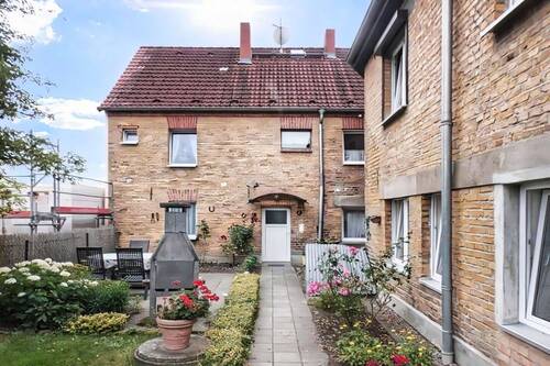 Rück- und Seitenansicht Gebäude - Einfamilienhaus mit 141,60 m&sup2; in Lychen zum Kaufen