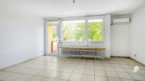 Wohnzimmer 1 - Gemütliche 3-Zimmer-Wohnung mit Balkon und tollem Grundriss in zentraler Lage