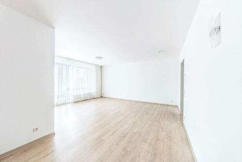 Wohn- und Essbereich - Sichere Investition: Solide vermietete Eigentumswohnung mit zuverlässigem Mieter