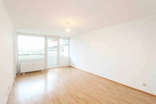 Wohnzimmer - 2 Zimmer Etagenwohnung in Unterschleißheim