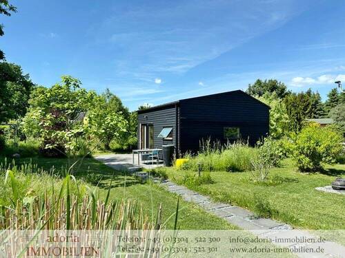 Haus + Garten - Modernes Kleinhaus in ökologischer und nachhaltiger Holzbauweise auf idyllischem Pachtgrundstück