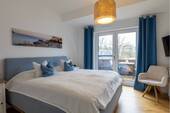 Schlafzimmer mit Balkon - 