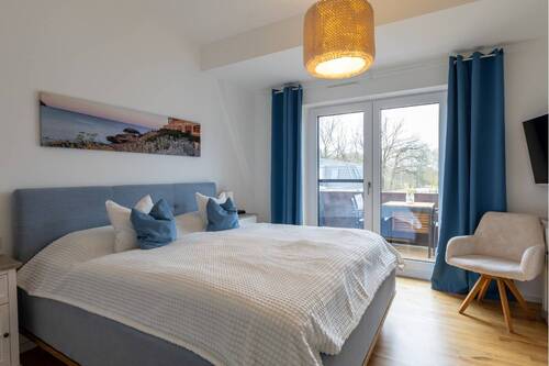 Schlafzimmer mit Balkon - 
