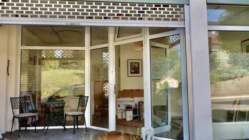 Eingang mit elektr. Schutzgitter - 