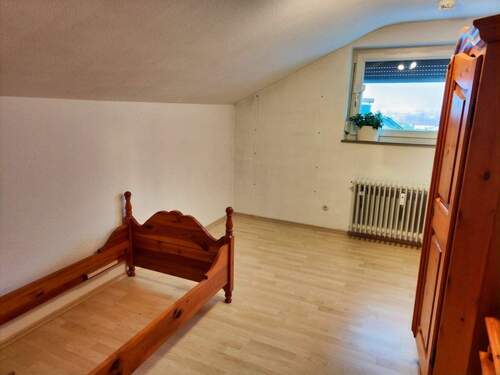 Zimmer im Dachgeschoß - 