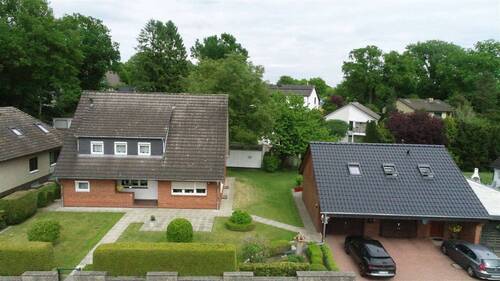 Objektansicht - ***ROSENGARTEN-NENNDORF***EINFAMILIENHAUS MIT DOPPELGARAGE UND SEPARATER WOHNUNG ZU VERKAUFEN***