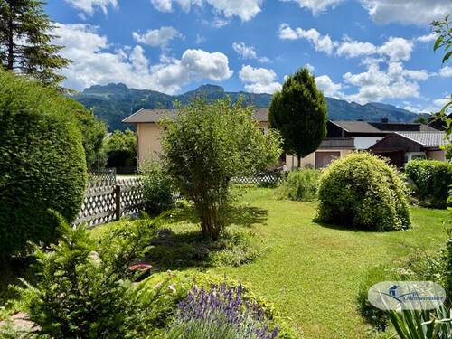 Bild 1 - 2-Zimmer Erdgeschosswohnung mit Garten und Kampenwandblick