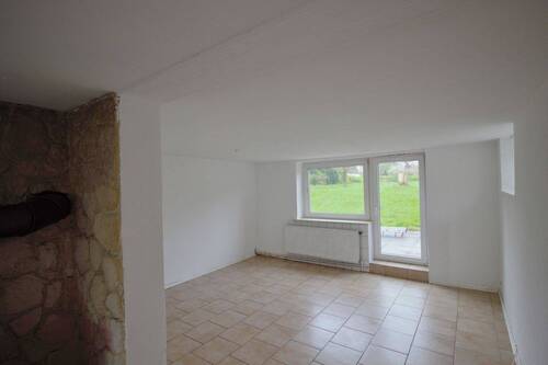 Wohnzimmer - Einfamilienhaus mit 107,10 m² in Süderhastedt zum Kaufen