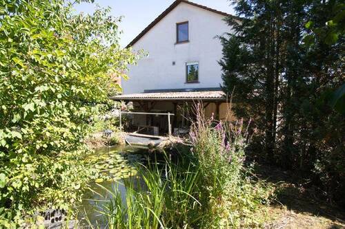Seitenansicht zum Wohnhaus im Bereich des 1. Oberg - 