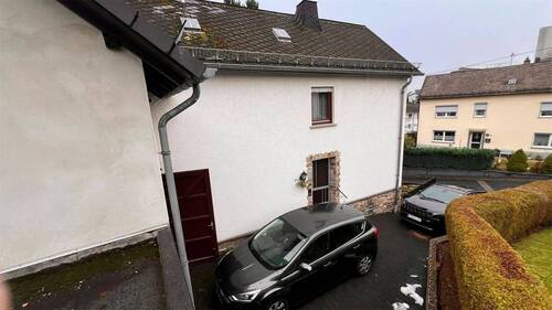 Seitenansicht - Hier stimmt der Preis: Großzügiges Wohnhaus mit Ausbaureserven und Garten für die Familie!